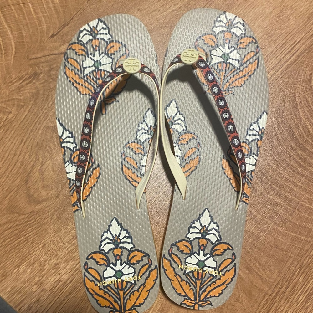 Tory Burch flip flops never worn
